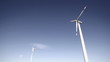Wind mills with blue sky - car view Wind mills with blue sky - car view