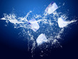 ice in water drops on the blue background