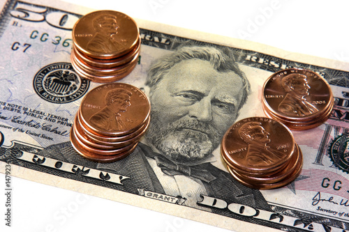 Photo: Fifty Dollar Bill and Stack of Pennies Fifty Dollar Bill and Stack of Pennies