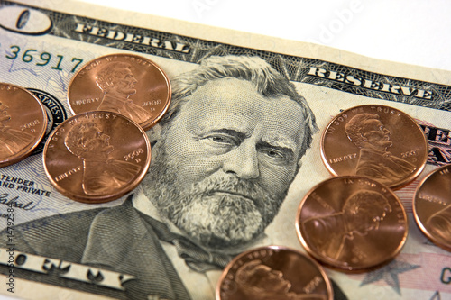 Photo: Fifty Dollar Bill and Stack of Pennies Fifty Dollar Bill and Stack of Pennies