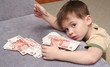 The nice boy considers money