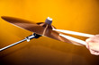 Cymbal Being Played on Yellow