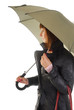 Photo: woman in coat under umbrella woman in coat under umbrella