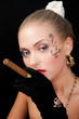 A cigar smoking girl