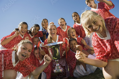 Photo: Girls' soccer team 13-17 holding trophy Girls' soccer team 13-17 holding trophy