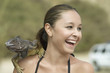 Laughing Woman with Iguana on Her Shoulder, close-up
