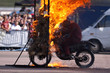 Stunt rider and wall of flames Stunt rider and wall of flames