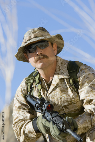 Photo: Soldier on patrol, outdoors Soldier on patrol, outdoors