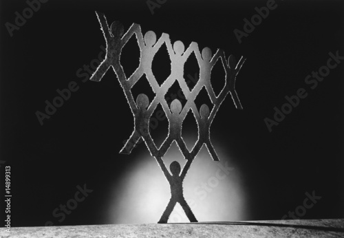 Photo: Pyramid of cut out paper figures, b&w Pyramid of cut out paper figures, b&w