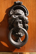 Metal knocker shaped woman