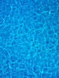 Blue water in swimming pool, view from above full frame