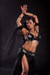 Exotic bellydancer in sexy black costume Exotic bellydancer in sexy black costume