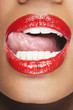 Woman Licking Red Lips