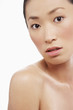 Young Asian woman, looking curious