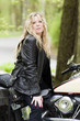 sexy woman on classic motorcycle