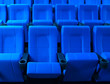 Dark blue rows of theater seats