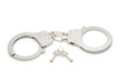 Closed handcuffs isolated on white background