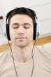 Man listening music with headphones