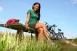 Woman resting from biking