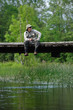 fisherman restin on the bridge