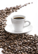 Coffee cup and grain on white background Coffee cup and grain on white background