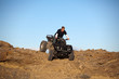 Photo: teen on ATV quad in the hills teen on ATV quad in the hills