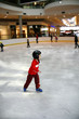Young boy learning to skate Young boy learning to skate