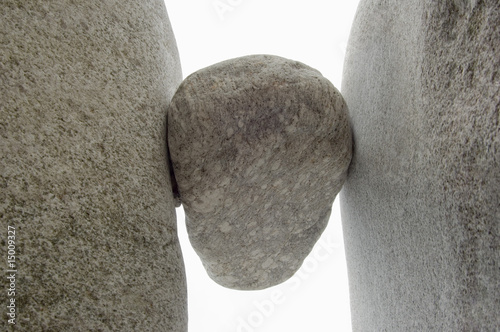 Photo: Rock wedged between two boulders Rock wedged between two boulders