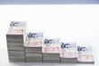Piles of sealed pound banknotes