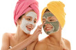 Photos : Two teenage girl applying facial cream