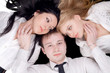 Photo: Portrait if the young man and two pretty women Portrait if the young man and two pretty women