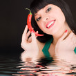 cute girl with chili pepper