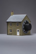 Small model of house with combination lock