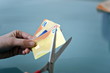 Hands cutting credit cards with scissors