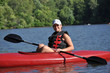 Foto: Cute Young Woman Kayaking Cute Young Woman Kayaking