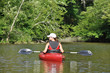 Foto: Woman Kayaking on the River Woman Kayaking on the River