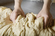 Baker Kneading Bread Dough