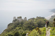 Couple Standing on an Outlook Above the Water