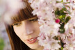 Young Woman Under a Blossoming Tree