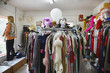 Clothing and Wigs in Crowded Second Hand Store