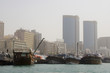 Photo: dubai uae dhows old wooden sailing vessels are docked along the deira side of dubai creek. dubai uae dhows old wooden sailing vessels are docked along the deira side of dubai creek.