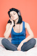 Woman listening music on headphones
