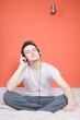Man listening to music with his eyes closed