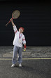 Boy winning tennis match