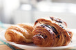 Chocolate croissant on plate Chocolate croissant on plate