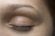 Close-up of young woman's closed eye