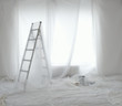 Photo: Empty room covered in transparent dust sheets prepared for painting and decorating Empty room covered in transparent dust sheets prepared for painting and decorating
