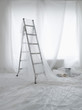 Photo: Empty room covered in transparent dust sheets prepared for painting and decorating Empty room covered in transparent dust sheets prepared for painting and decorating