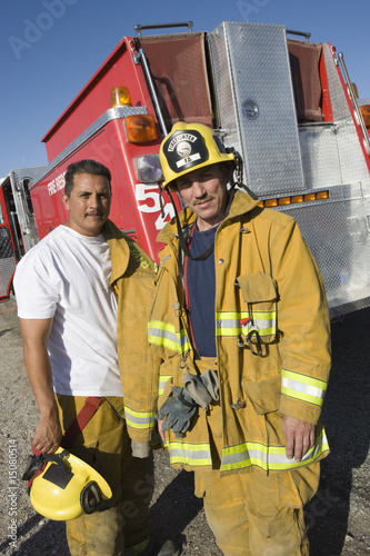 Photo: Firefighters and truck Firefighters and truck