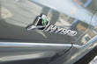Close up of sing on hybrid car